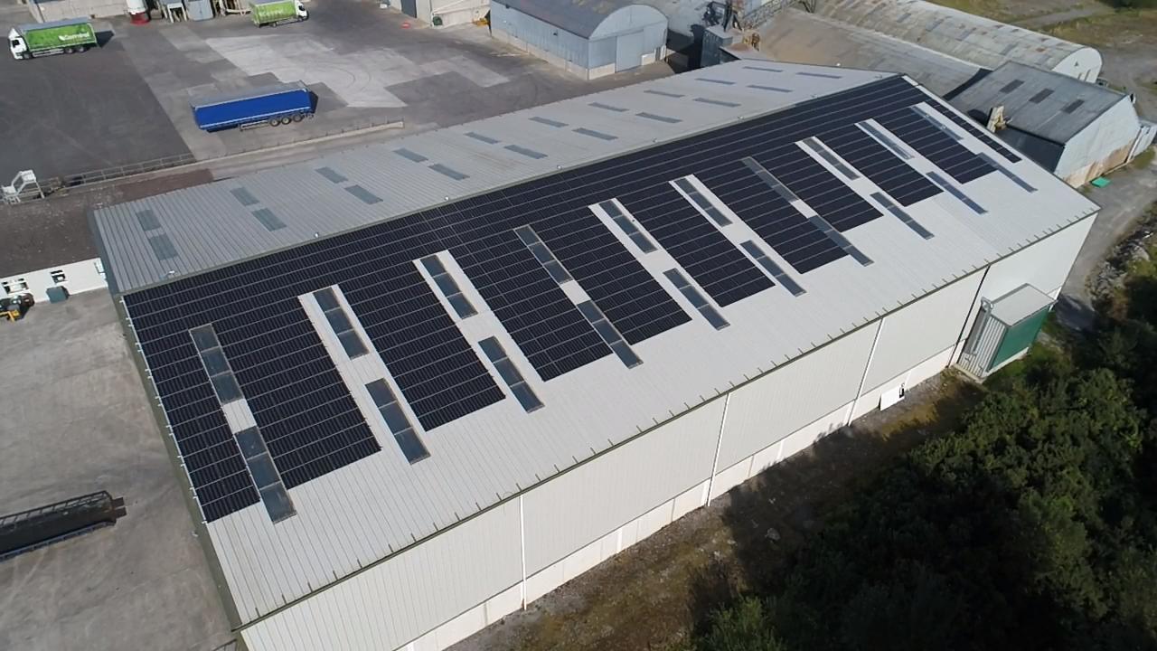 Solar panels installed on the roof of a grain store, harnessing sunlight to generate renewable energy for the building’s operations and reduce energy costs